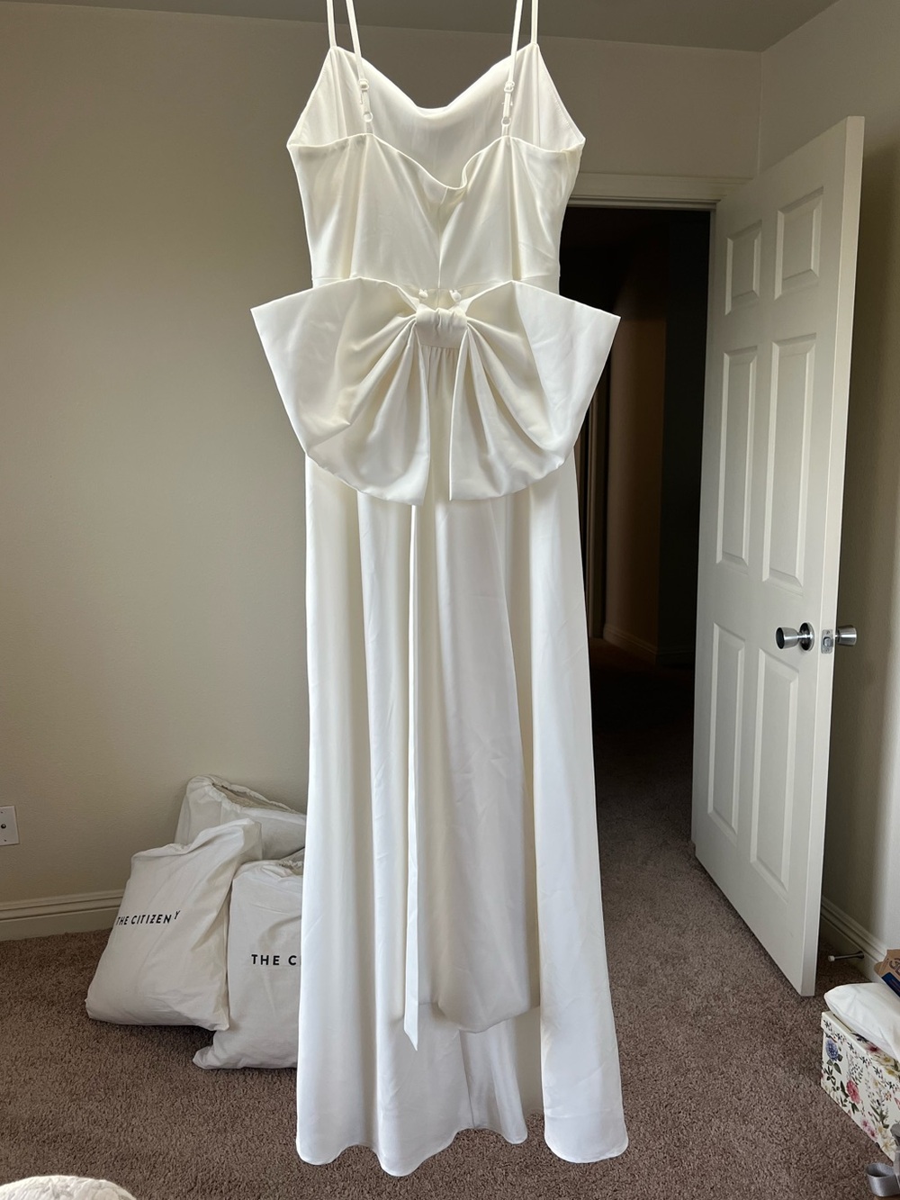 White Spaghetti-Strap Wedding Dress with Sculpted Bow Detail